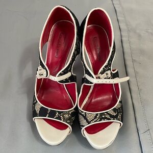 Cesare Paciotti lace platform heels. Buckles at instep so it’s adjustable.